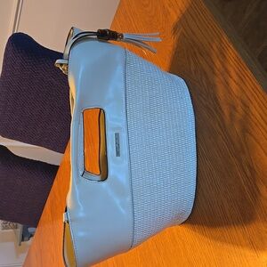 Simply Noelle purse. Neutral color. Imitation leather and straw texture.